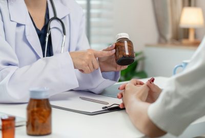 Doctor Consulting Patient on Medication Management for Effective Treatment